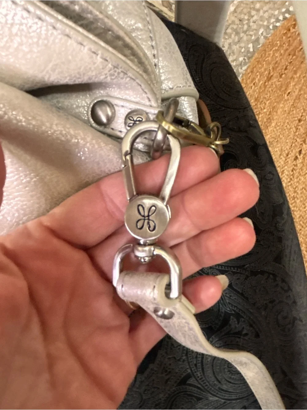hOBO Metallic Silver Women’s Satchel Bag with Heart Charm